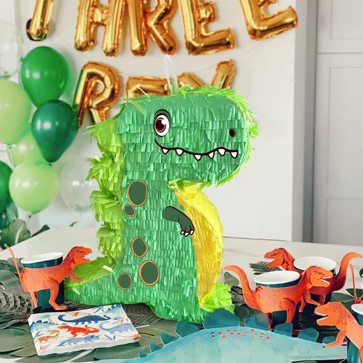 pinata dinosaure vert table napkin verres ballons